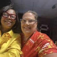 Bright women celebrating at Do it a-Ginn Event Hall, showcasing a lively indoor event, vibrant attire, and joyful atmosphere at a popular venue for gatherings and celebrations.