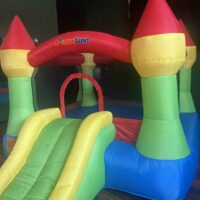 Colorful inflatable bounce house for children's parties at Do it a-Ginn Event Hall, perfect for family-friendly events, birthday celebrations, and fun-filled gatherings.